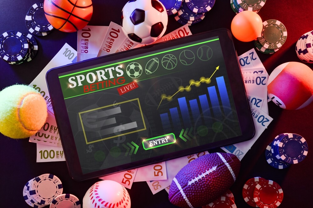 Online,Sports,Betting,With,Tablet,With,Application,In,The,Center