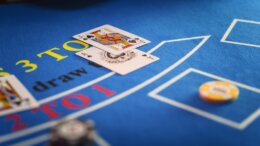 Close,Up,On,Casino,Baccarat,Gambling,Table:,Anonymous,Croupier,Dealing